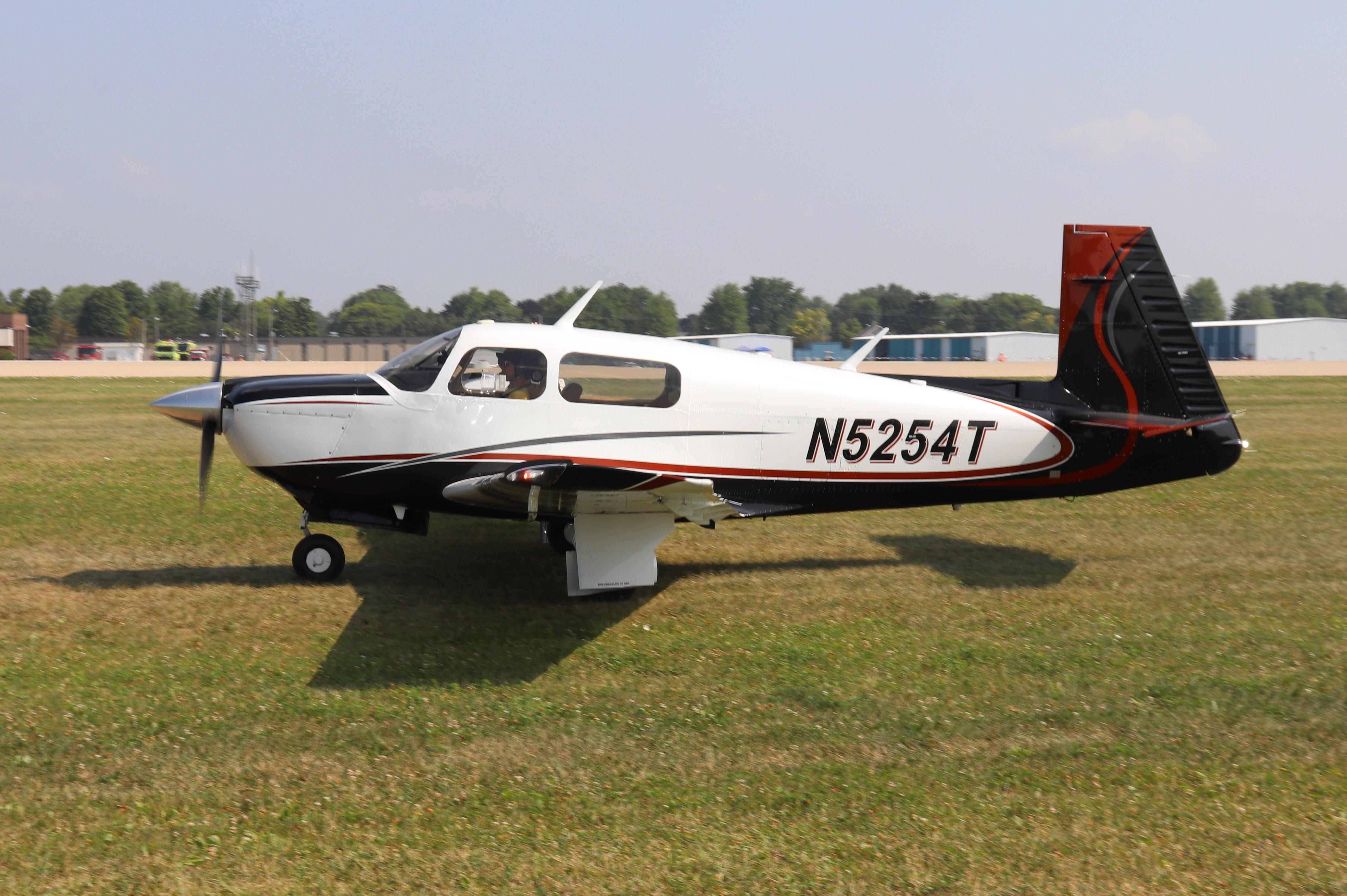 Aircraft N5254T, Mooney M20J, at KOSH, photo by MarkPasqualino