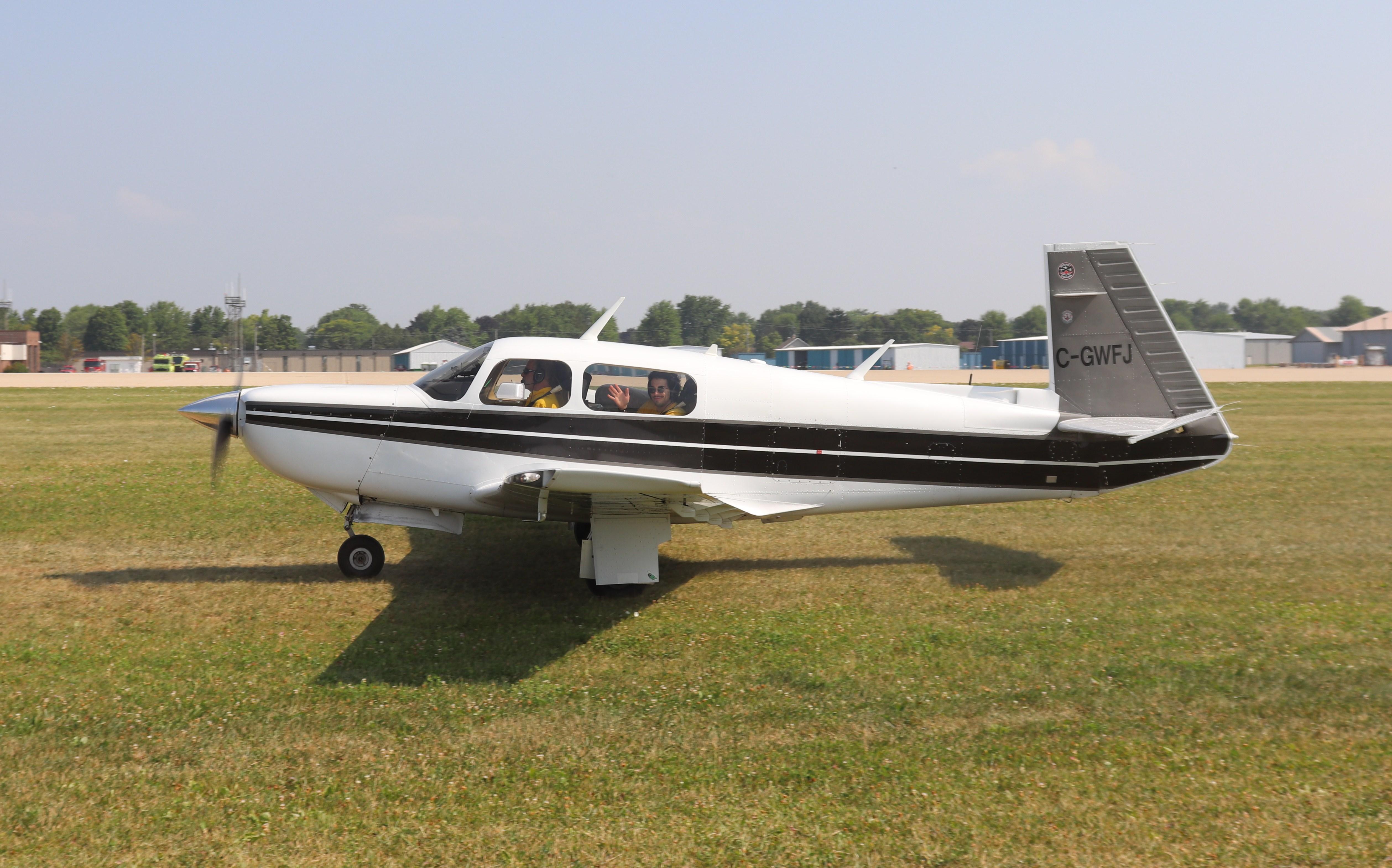 Aircraft C-GWFJ, Mooney M20K, at KOSH, photo by MarkPasqualino