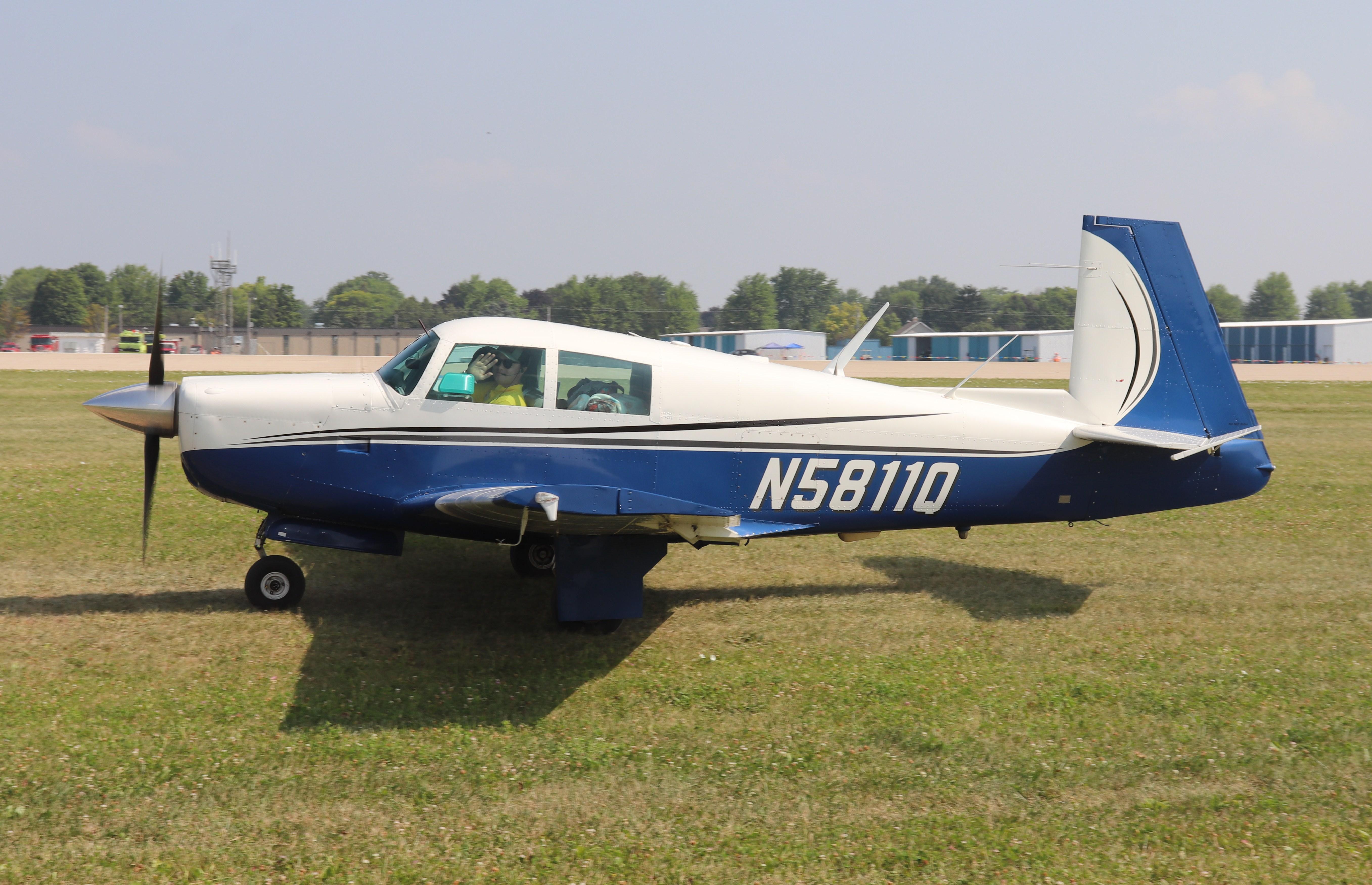 Aircraft N5811Q, Mooney M20E, at KOSH, photo by MarkPasqualino