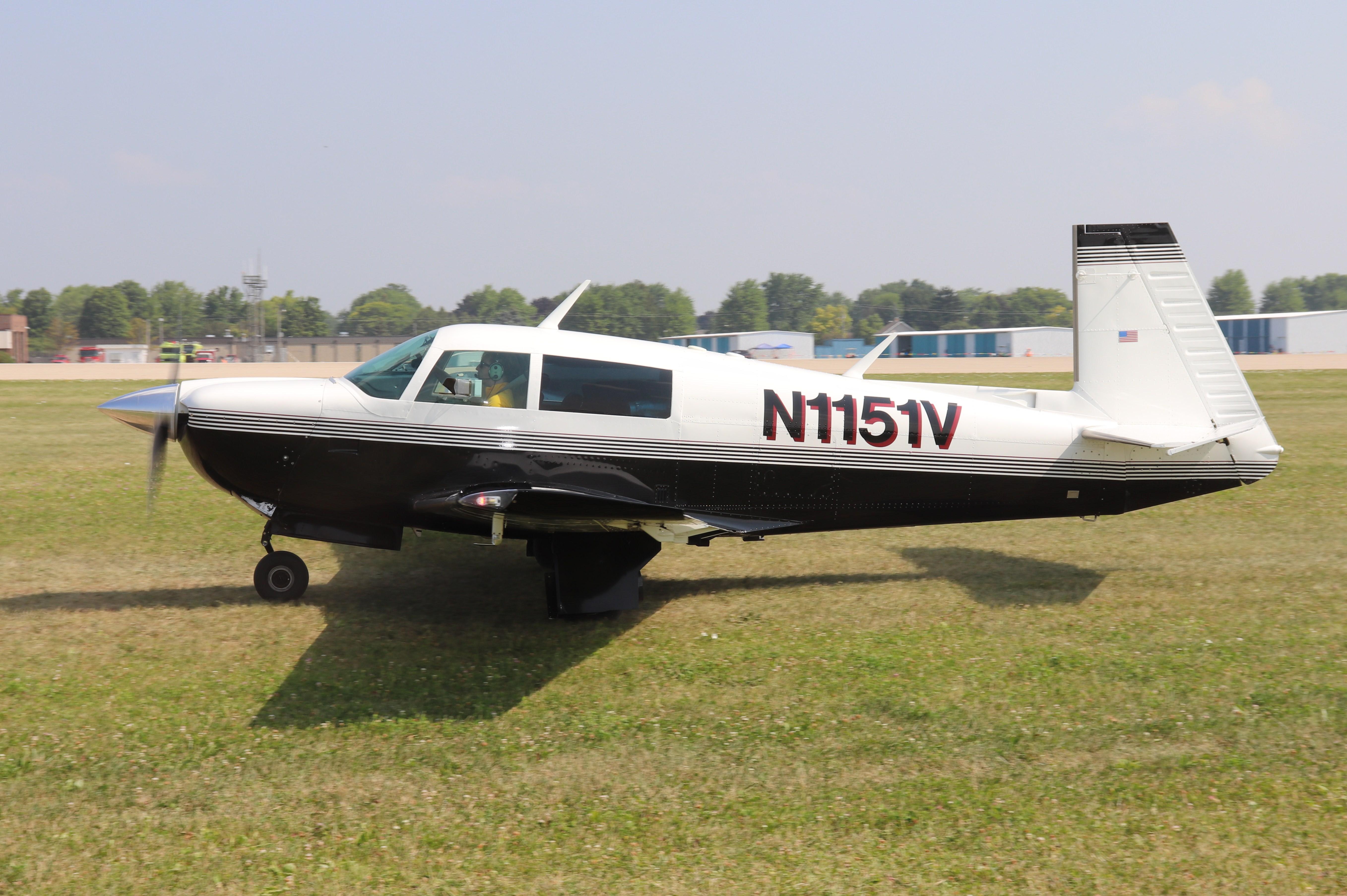 Aircraft N1151V, Mooney M20J, at KOSH, photo by MarkPasqualino