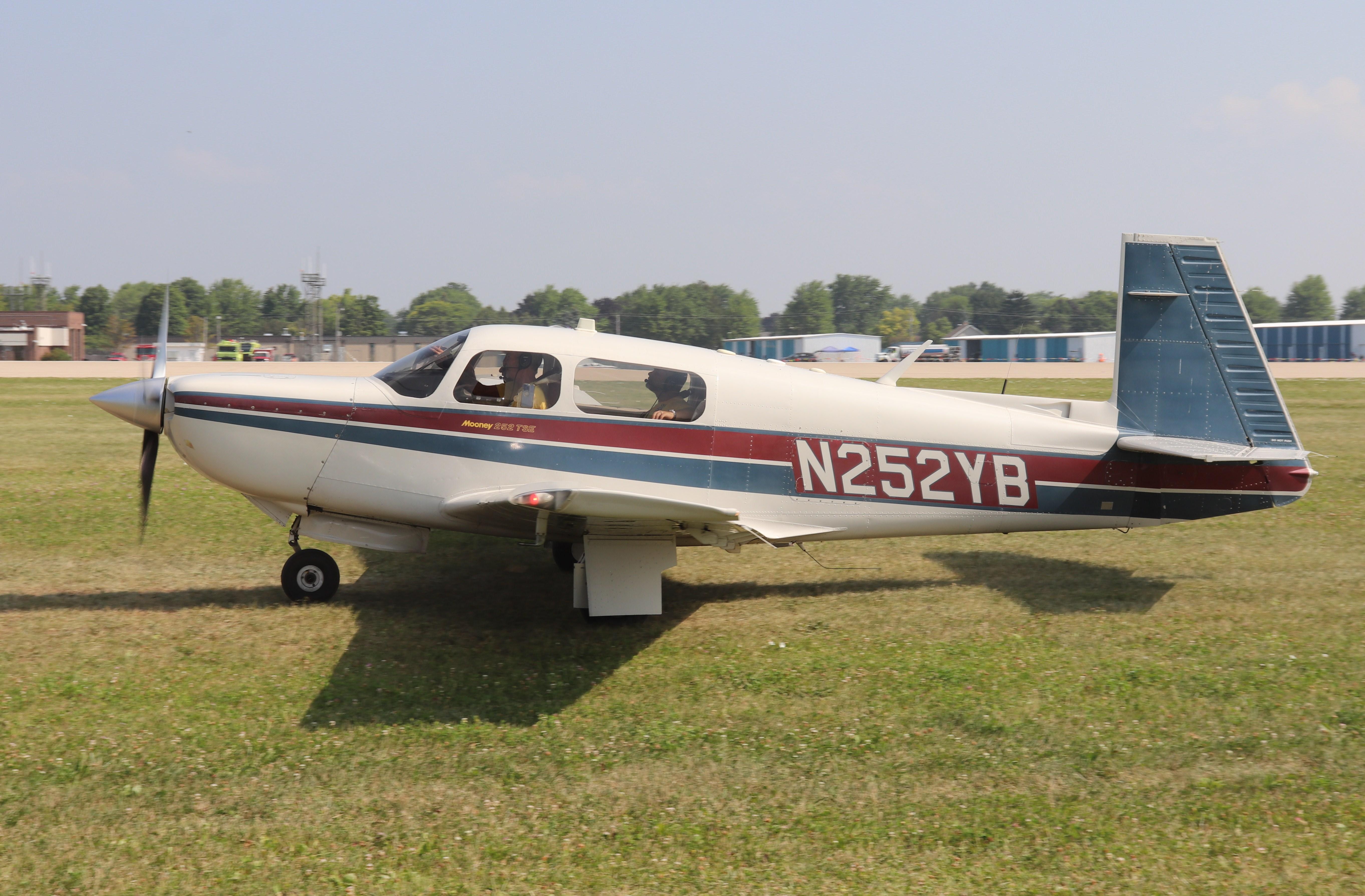 Aircraft N252YB, Mooney M20K, at KOSH, photo by MarkPasqualino