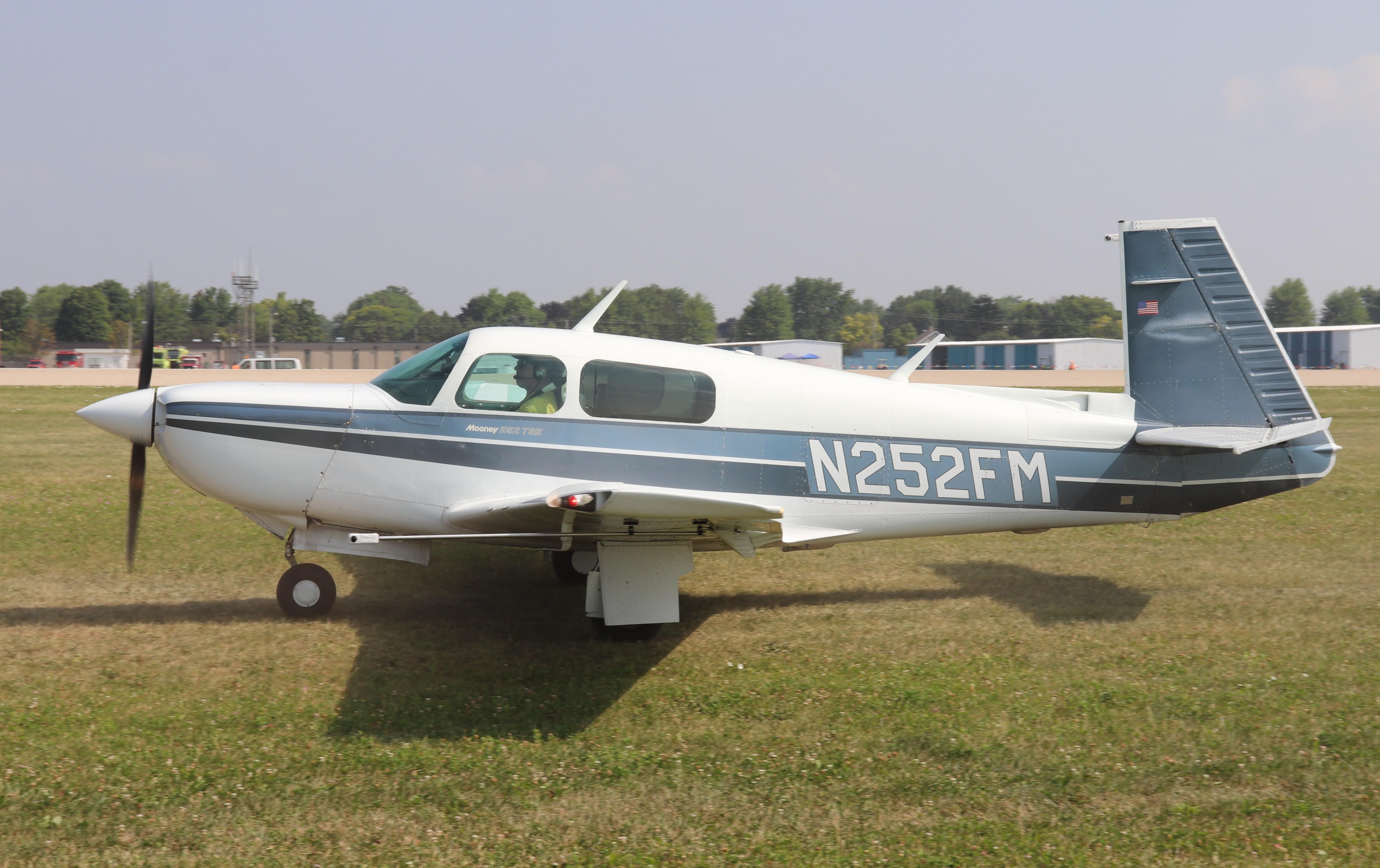Aircraft N252FM, Mooney M20K, at KOSH, photo by MarkPasqualino