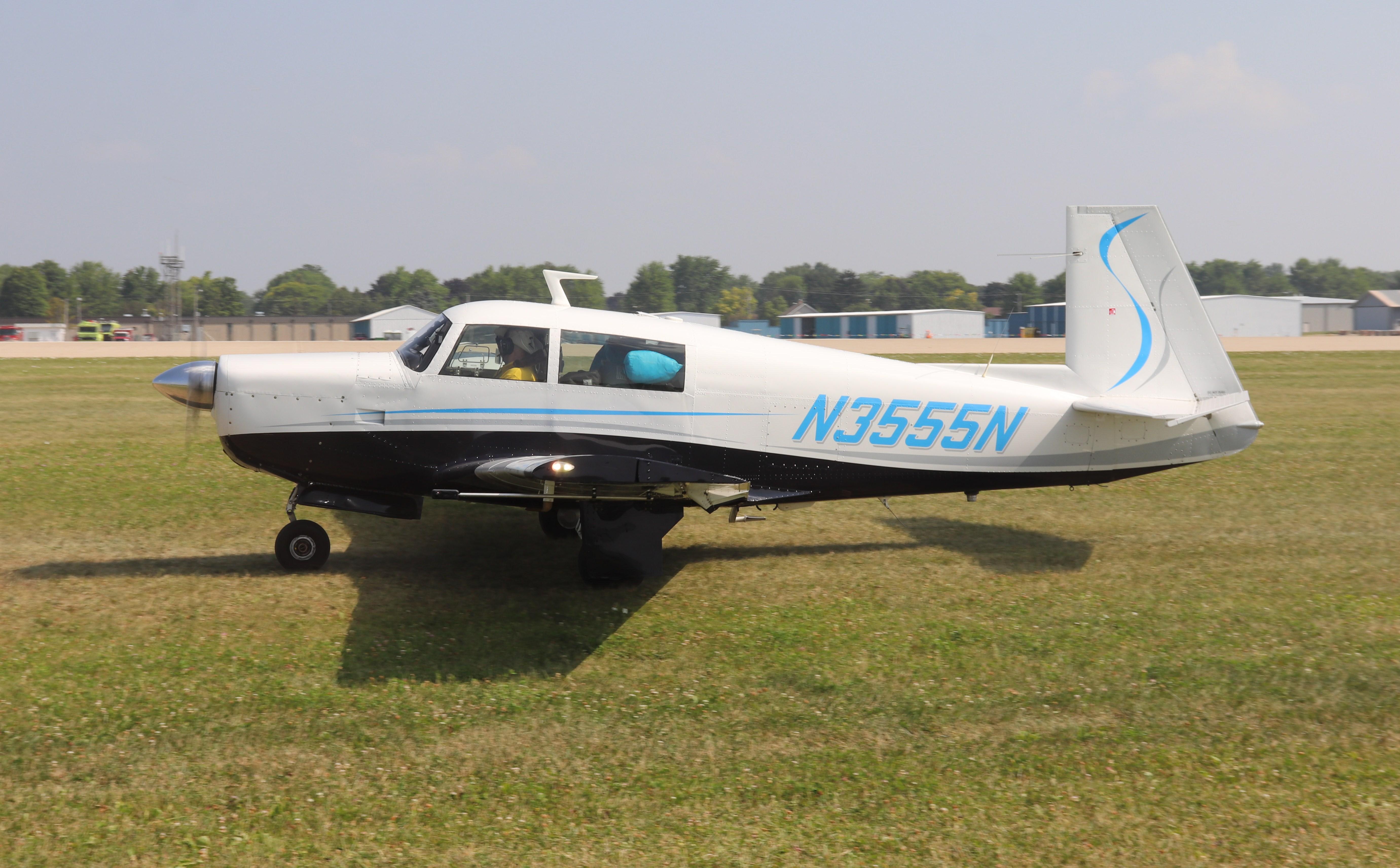 Aircraft N3555N, Mooney M20F, at KOSH, photo by MarkPasqualino