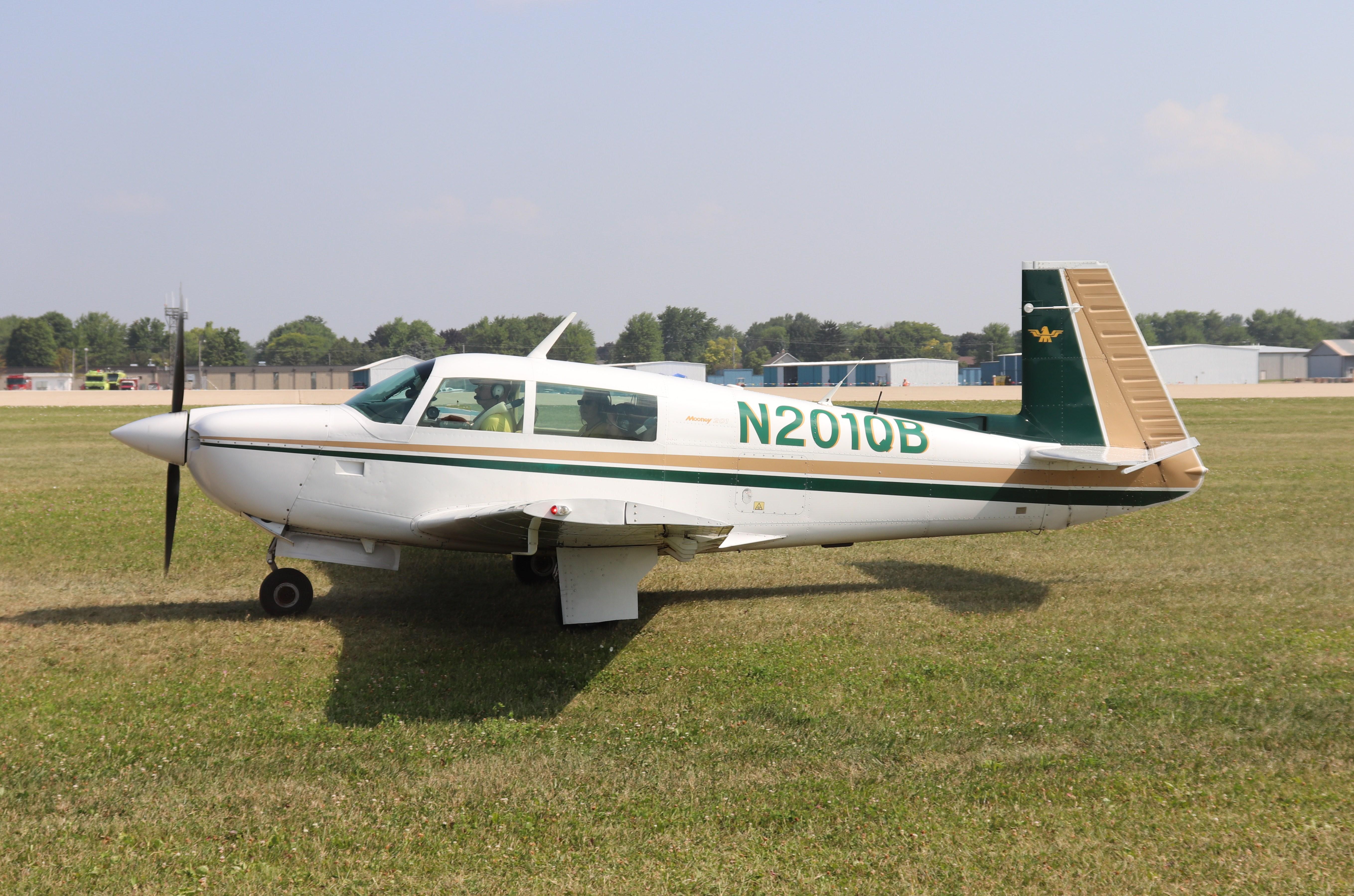 Aircraft N201QB, Mooney M20J, at KOSH, photo by MarkPasqualino