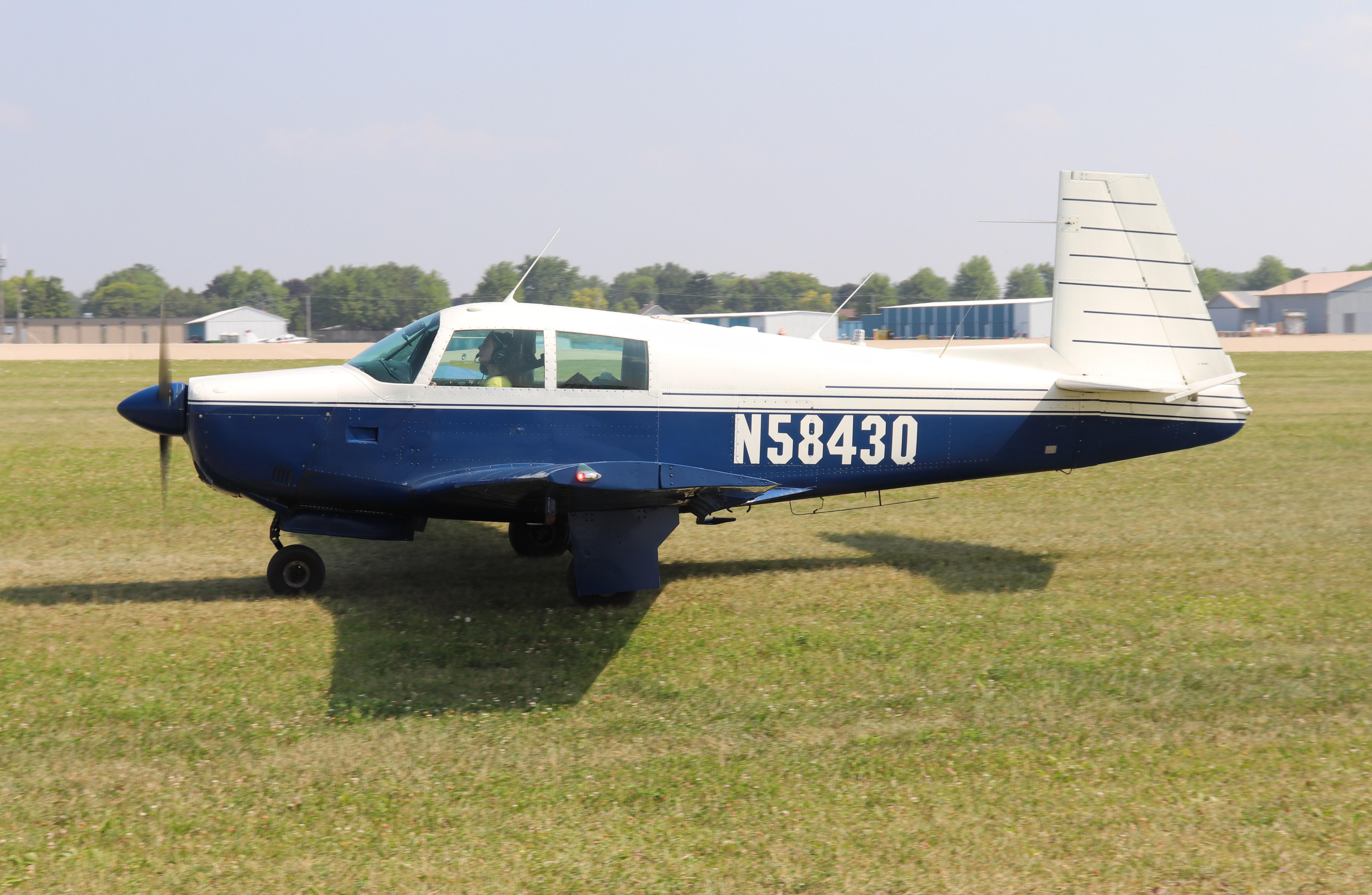 Aircraft N5843Q, Mooney M20E, at KOSH, photo by MarkPasqualino
