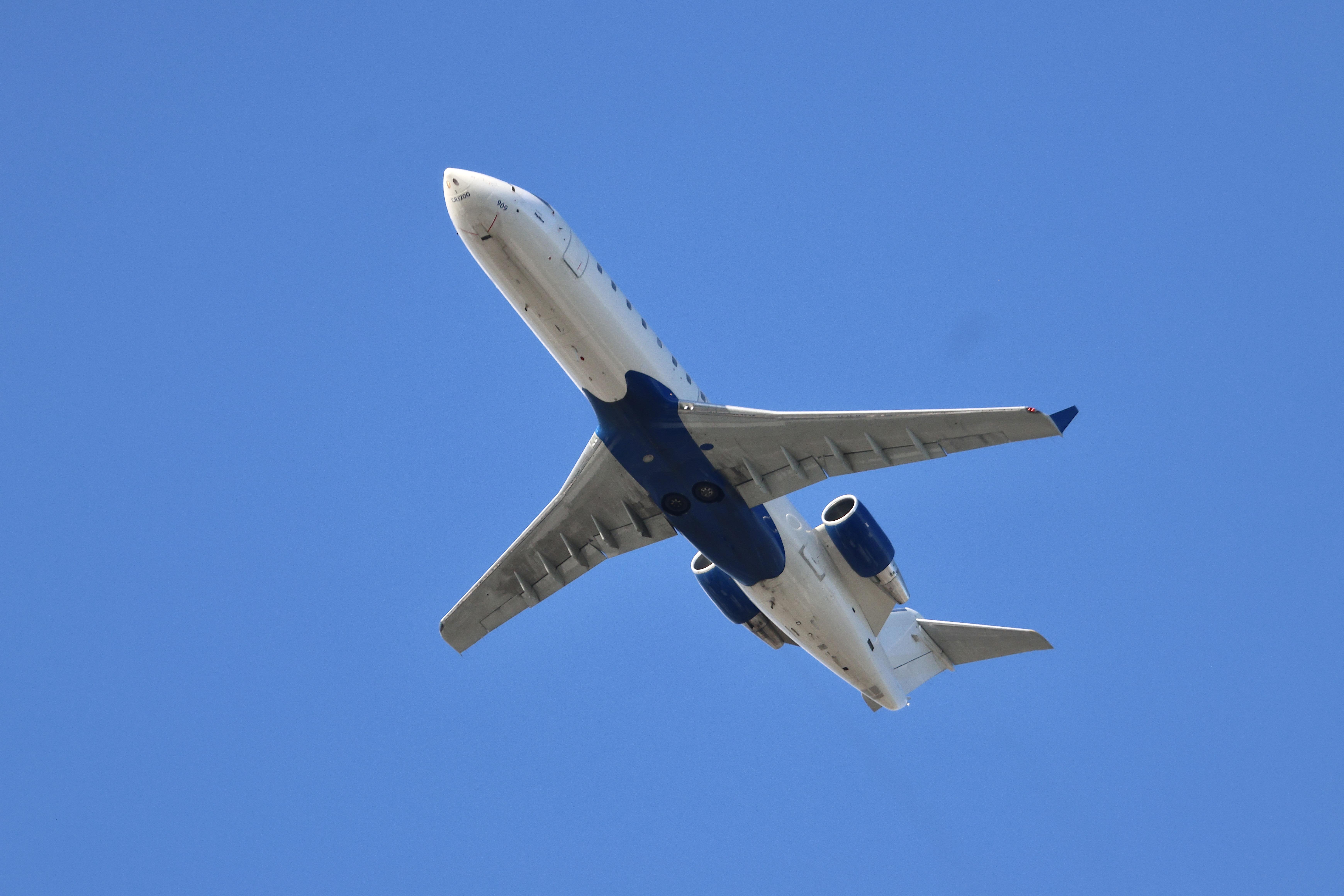 Aircraft N909EV, CRJ2 SkyWest / United Express Bombardier CRJ-200ER, N909EV departing 28R KORD, at KORD, photo by MarkKalfas