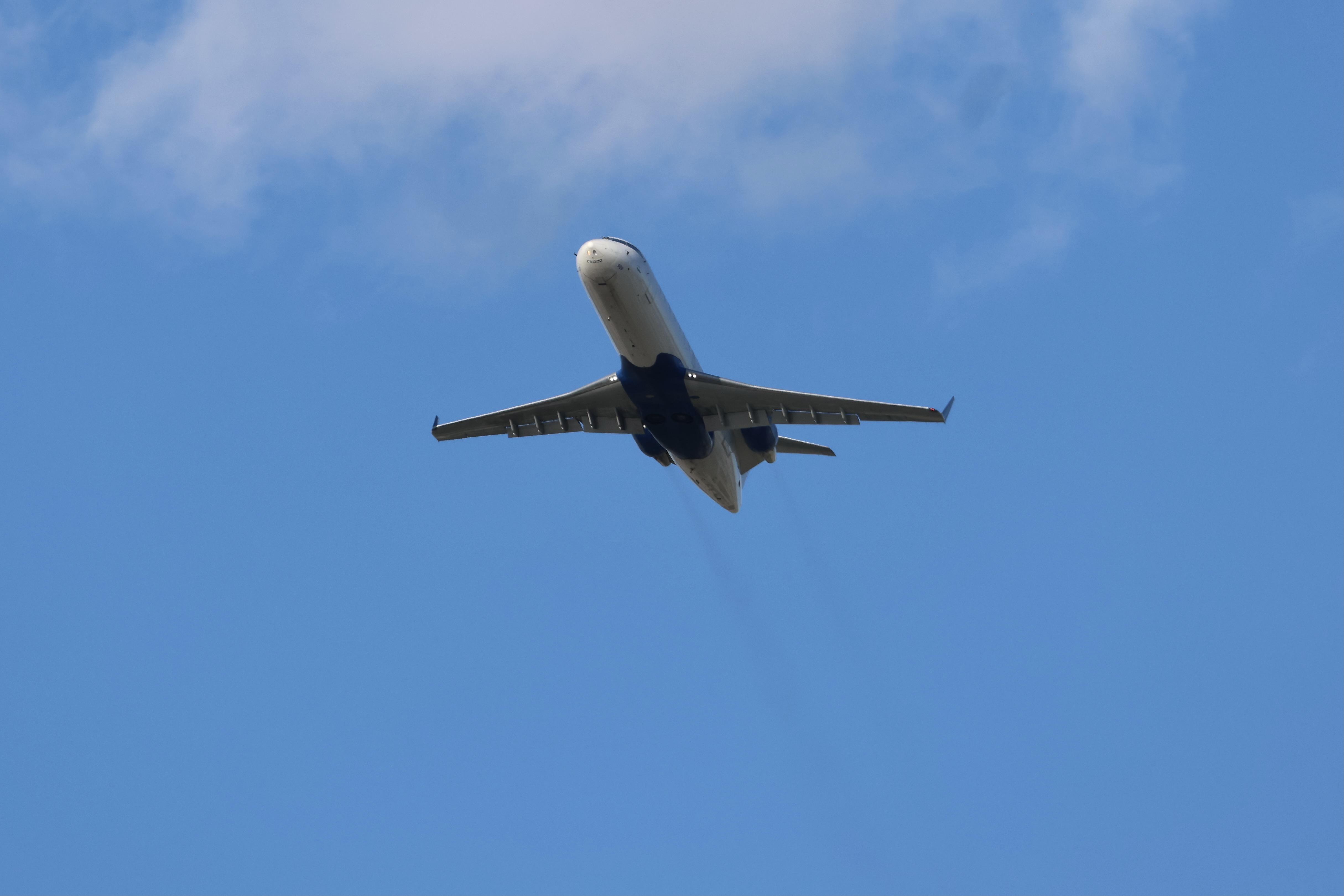 Aircraft N909EV, CRJ2 SkyWest / United Express Bombardier CRJ-200ER, N909EV departing 28R KORD, at KORD, photo by MarkKalfas