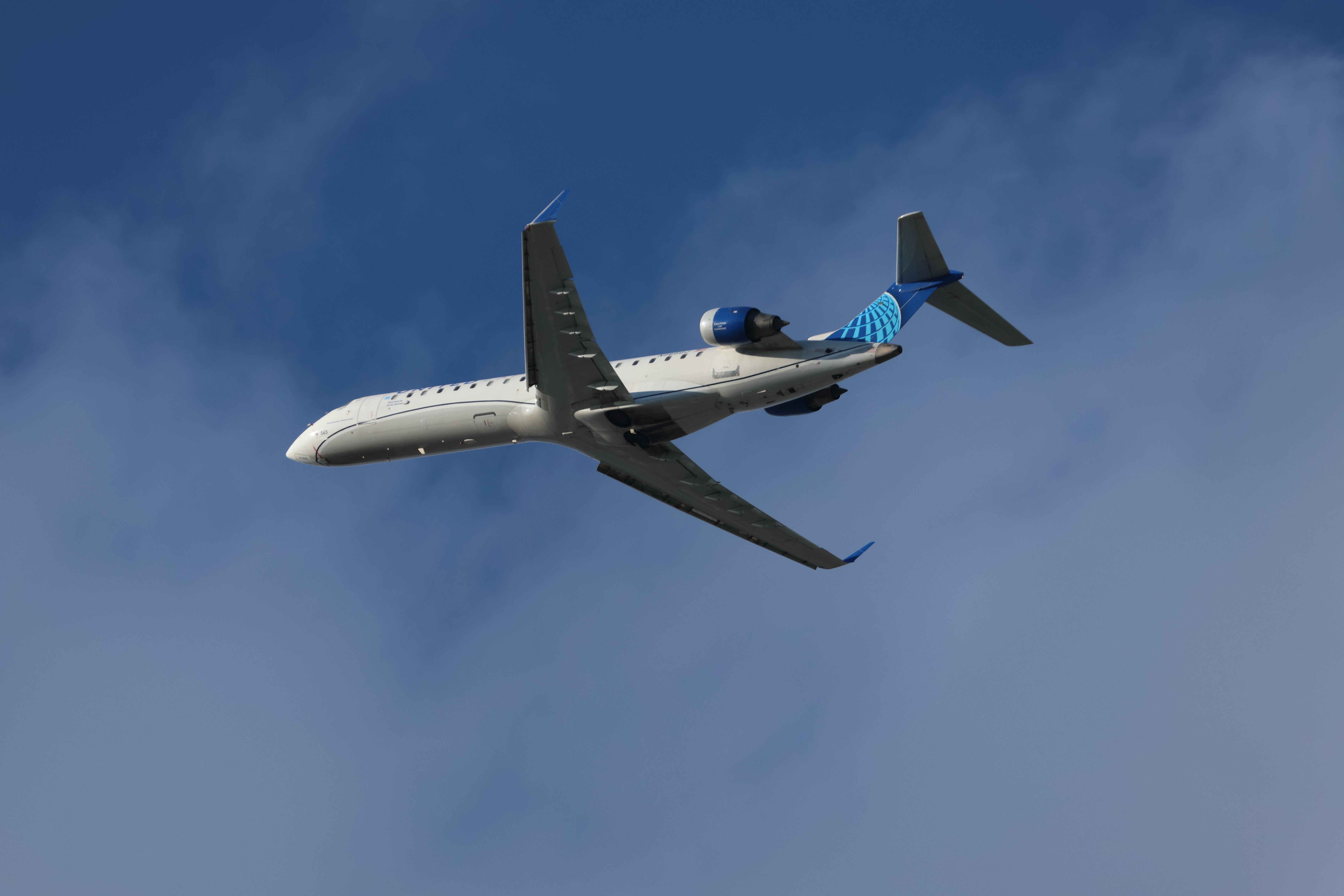 Aircraft N565GJ, CRJ7 GoJet/United Express Bombardier CRJ 550, N565GJ departing 28R KORD, at KORD, photo by MarkKalfas