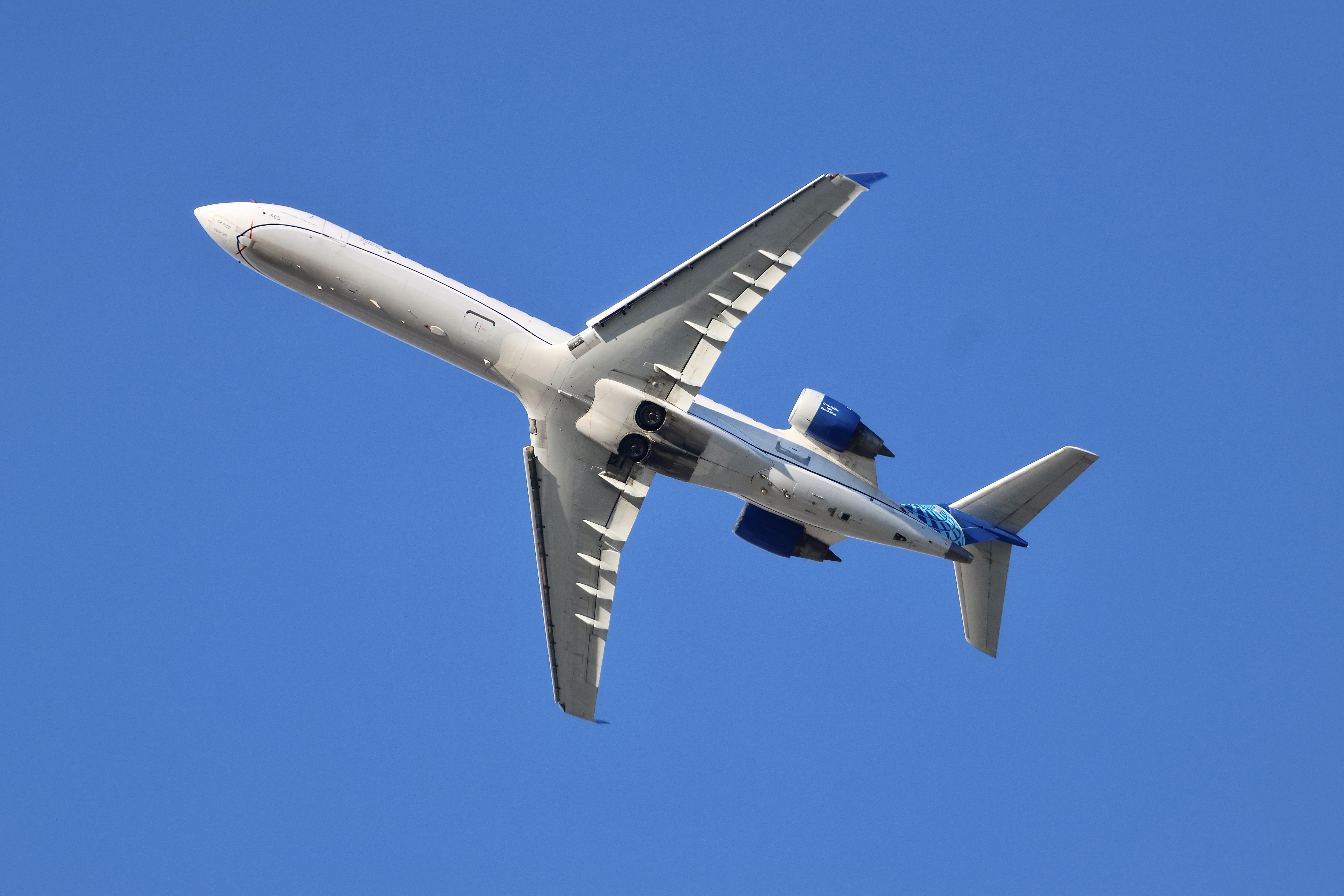 Aircraft N565GJ, CRJ7 GoJet/United Express Bombardier CRJ 550, N565GJ departing 28R KORD, at KORD, photo by MarkKalfas