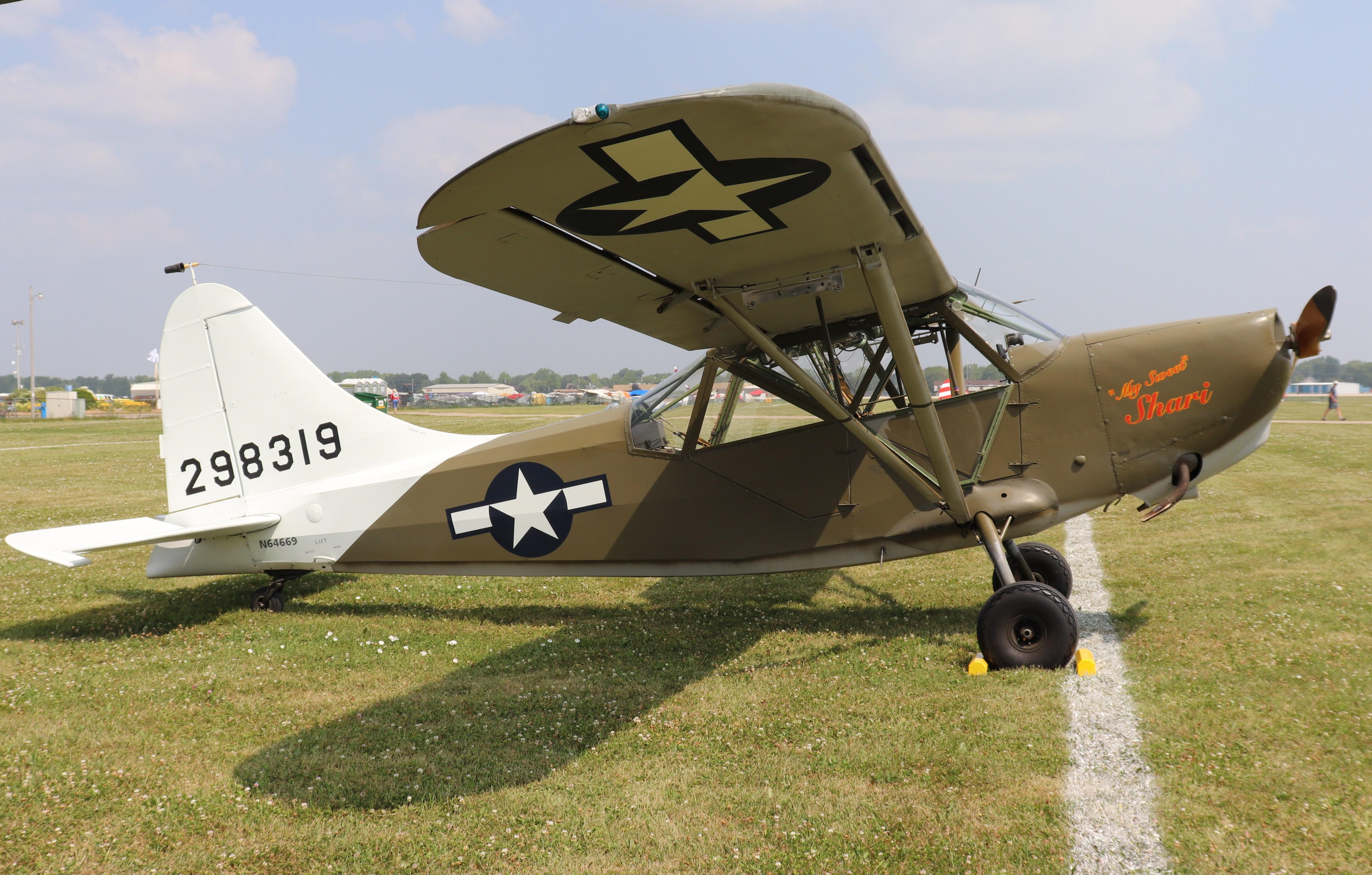 Aircraft N64669, Stinson L-5, at KOSH, photo by MarkPasqualino