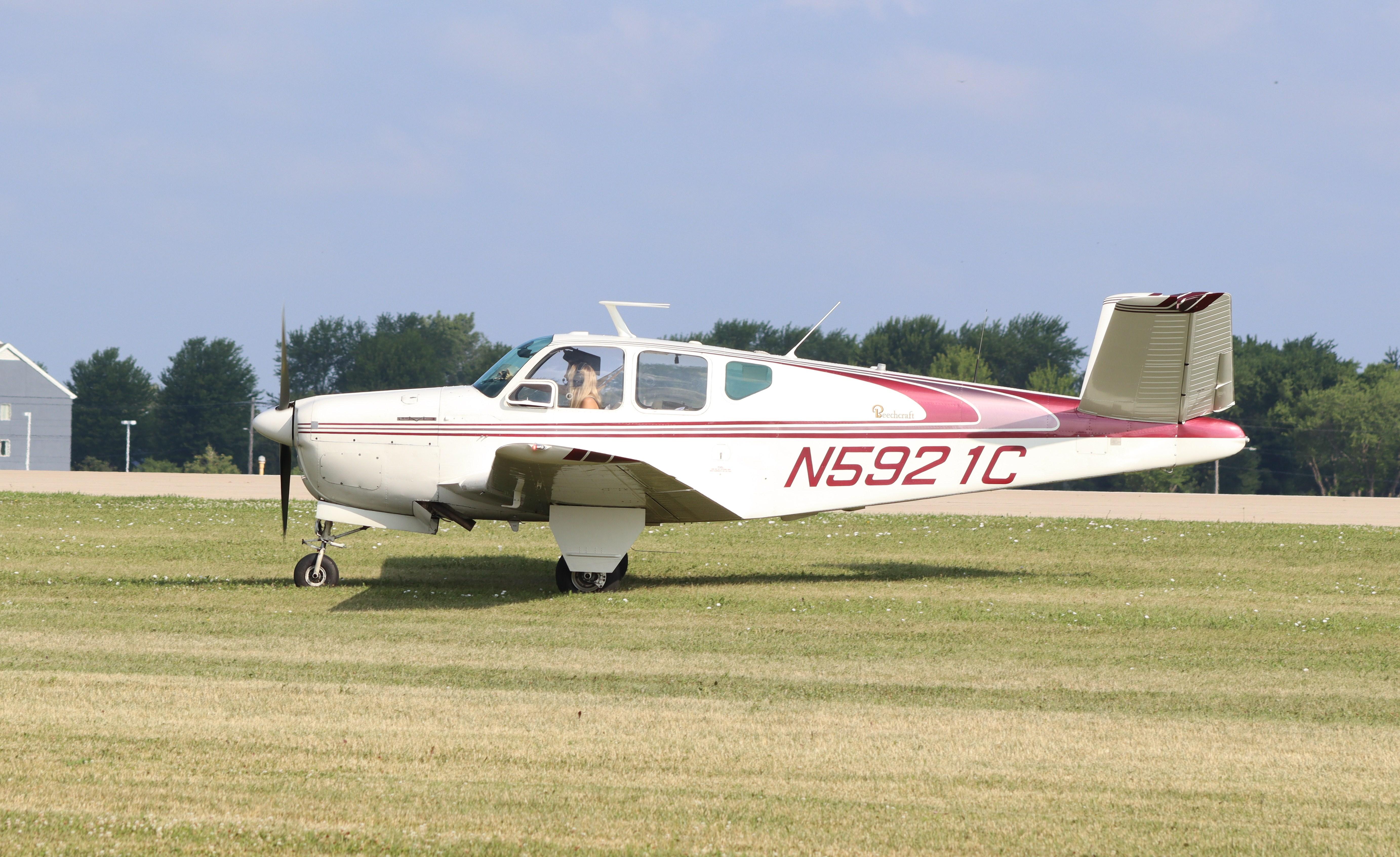 Aircraft N5921C, Beech C35, at KOSH, photo by MarkPasqualino