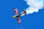 Aircraft N703EX, Red Bull Extra 300, at KOSH, photo by topgunphotography