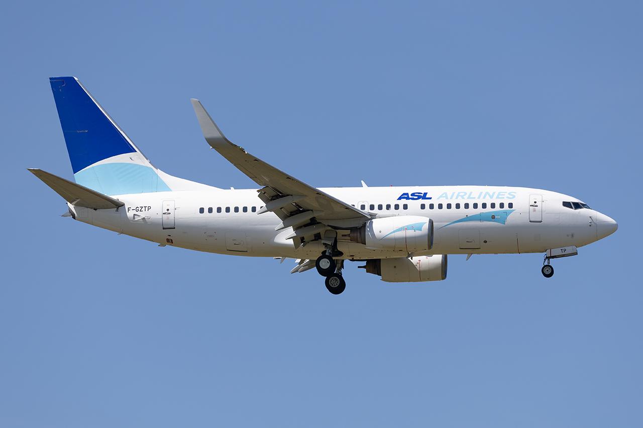 Aircraft F-GZTP, ASL 737-700, at LOWW, photo by Andy Graf