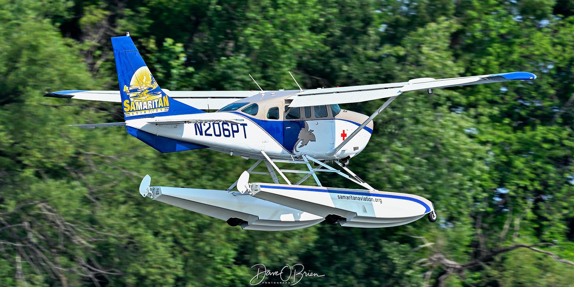 Aircraft N206PT, Floatplane landing Oshkosh 26, at 96WI, photo by topgunphotography