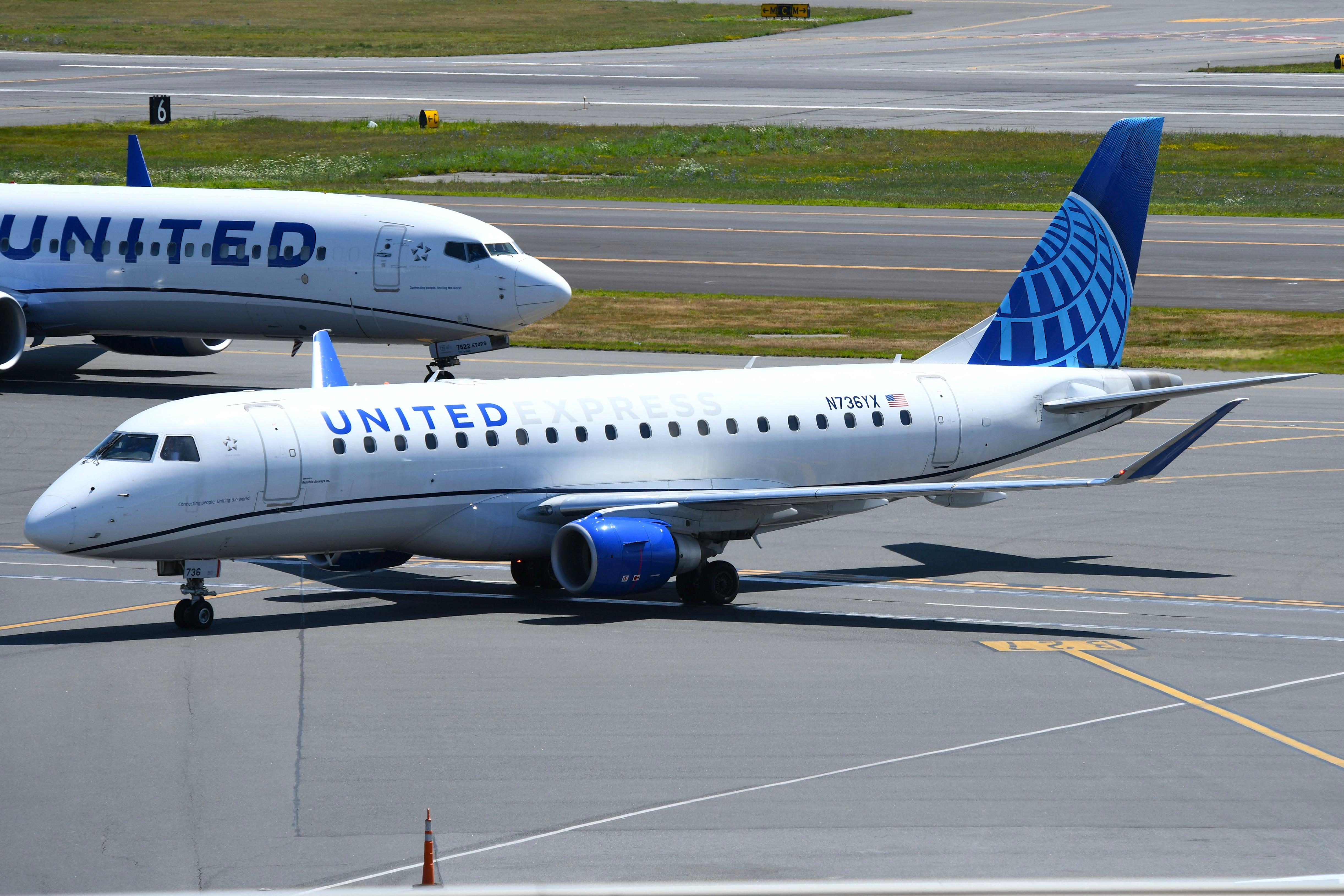 Aircraft N736YX, United Express ERJ170 arriving its gate, at KBOS, photo by FerryPNL