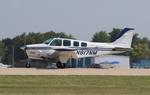 Aircraft N817NM, Beech A36TC, at KOSH, photo by MarkPasqualino