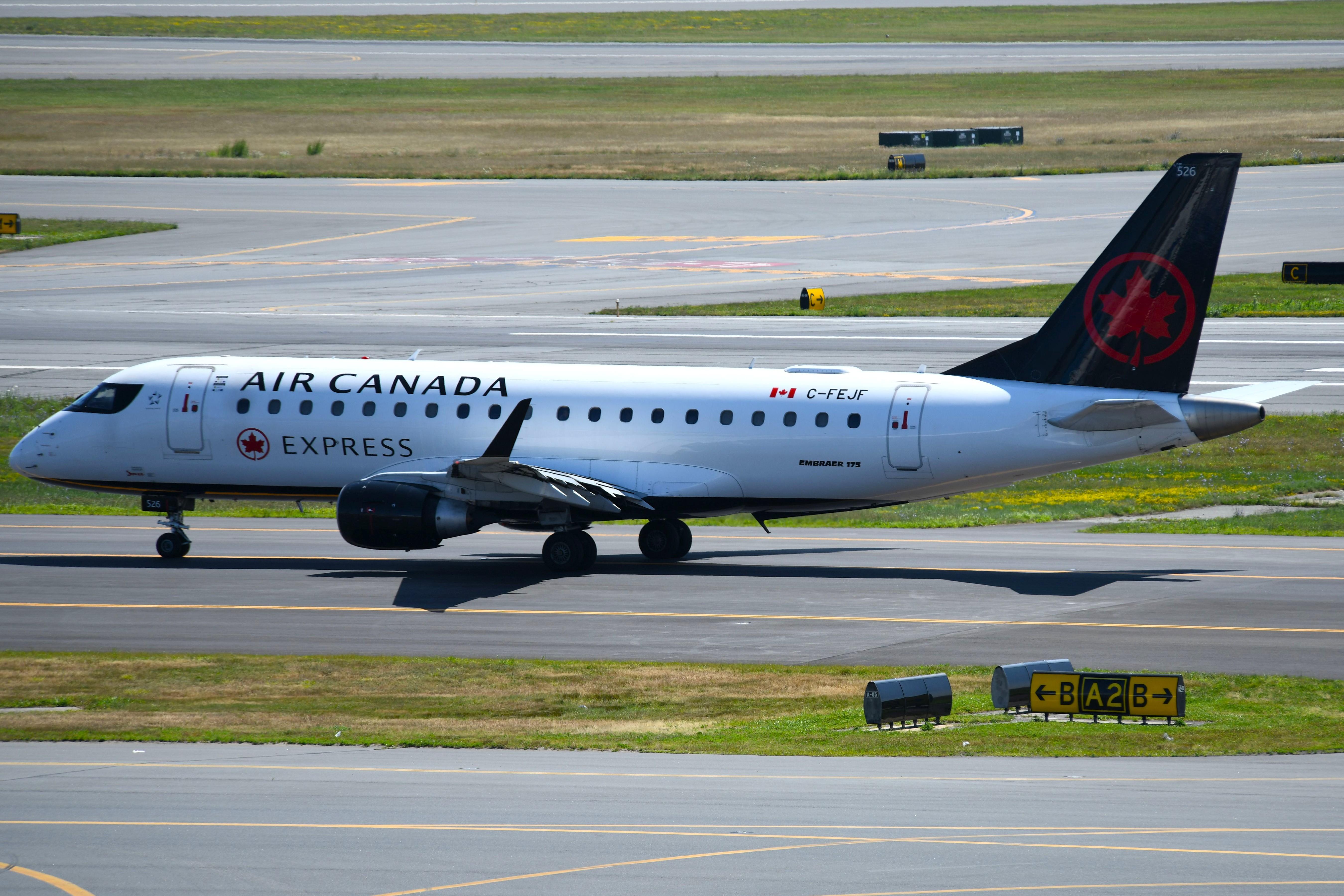 Aircraft C-FEJF, Air Canada Express ERJ175, at KBOS, photo by FerryPNL