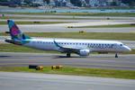 Aircraft VQ-BLZ, Bermudair ERJ190 has AnguillAir tittles on the right side of the airframe., at KBOS, photo by FerryPNL