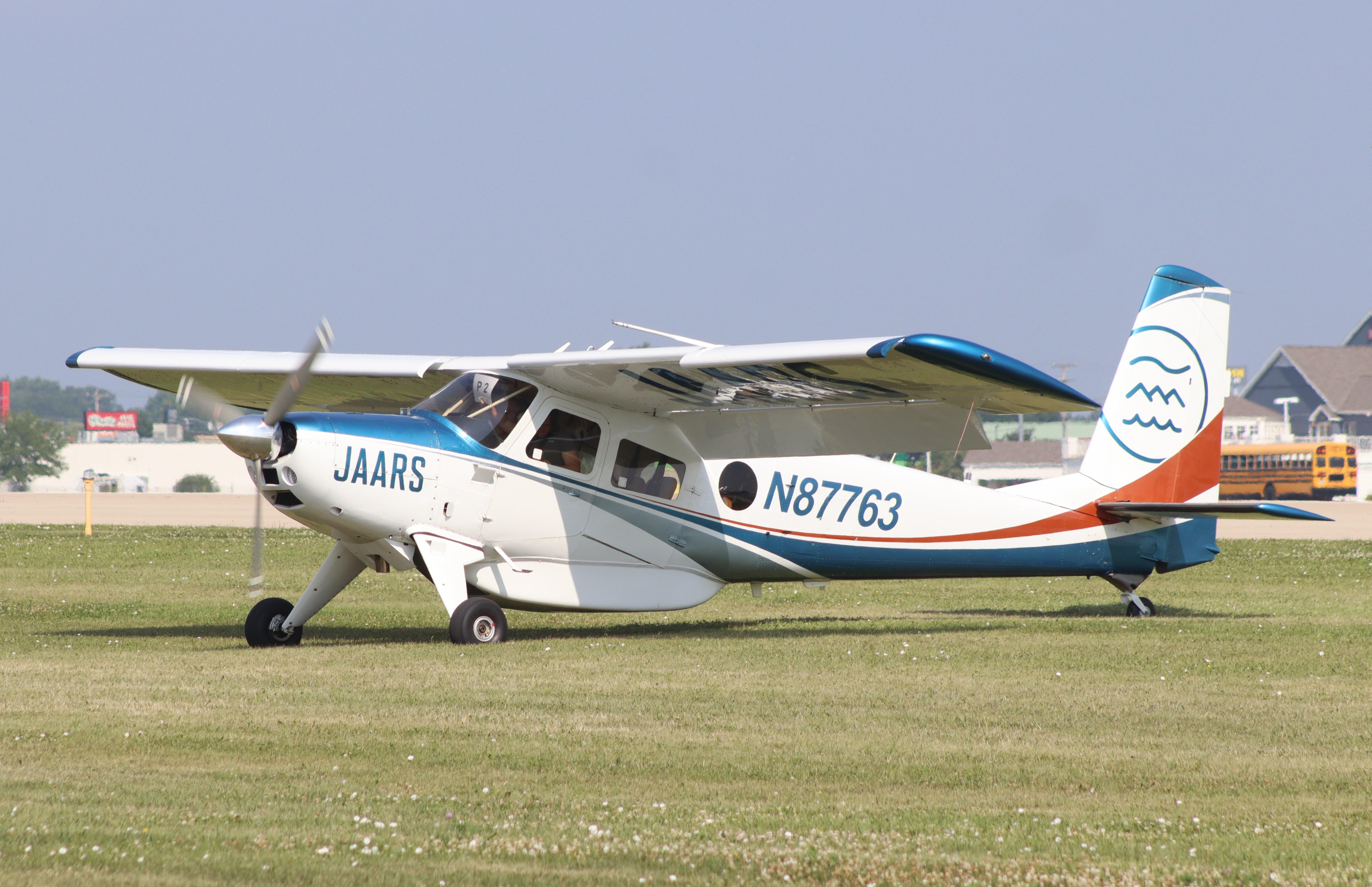 Aircraft N87763, Helio U-10B Super Courier, at KOSH, photo by MarkPasqualino