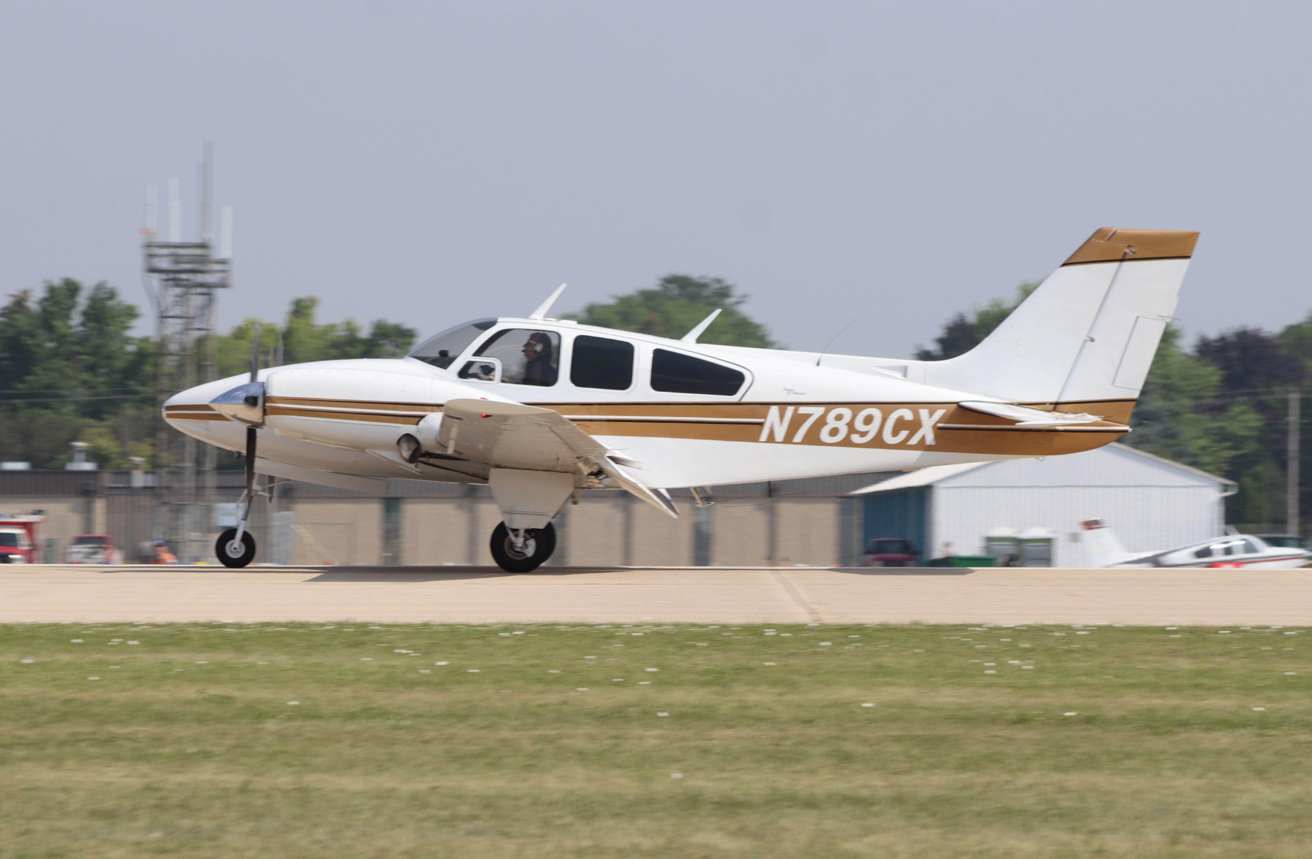 Aircraft N789CX, Beech A56TC, at KOSH, photo by MarkPasqualino