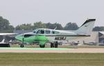 Aircraft N63RJ, Beech B55, at KOSH, photo by MarkPasqualino