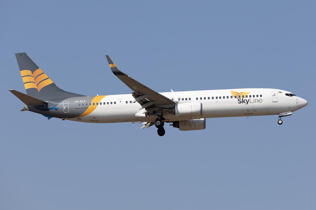 Aircraft UR-SLX, Skyline 737-900, at LOWW, photo by Andy Graf