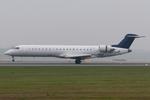 Aircraft ES-ACE, Untitled CRJ900, at LOWW, photo by Andy Graf
