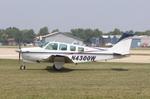 Aircraft N4300W, Beech A36, at KOSH, photo by MarkPasqualino
