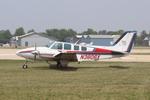 Aircraft N3806X, Beech 58, at KOSH, photo by MarkPasqualino