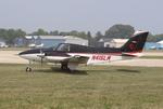 Aircraft N415LW, Beech 58, at KOSH, photo by MarkPasqualino