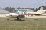 Aircraft N7973M, Beech C55, at KOSH, photo by MarkPasqualino
