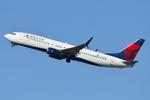 Aircraft N387DA, 26 year old B738 departing, at KBOS, photo by FerryPNL