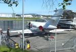 Aircraft N256V, Dassault Falcon 10 undergoing maintenance outside the Dornier Museum at the Bodensee airport, Friedrichshafen, at EDNY, photo by iwarnecke