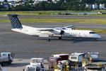Aircraft C-GLQM, Porter DHC8 ready to fly back to Toronto, at KBOS, photo by FerryPNL