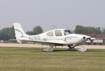 Aircraft N218CD, Cirrus SR20, at KOSH, photo by MarkPasqualino