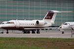 Aircraft XA-TZF, Untitled CL604, at LOWW, photo by Andy Graf