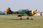 Aircraft N152JB, Yakovlev Yak-52, at KOSH, photo by MarkPasqualino