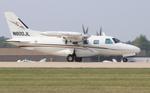 Aircraft N800JL, Mitsubishi MU-2B-60, at KOSH, photo by MarkPasqualino