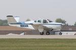 Aircraft N9830R, Beech M35, at KOSH, photo by MarkPasqualino