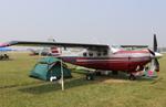 Aircraft N999KM, Cessna P210N, at KOSH, photo by MarkPasqualino
