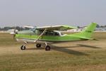 Aircraft C-GUEK, Cessna P206D, at KOSH, photo by MarkPasqualino
