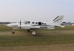 Aircraft N5874C, Cessna 421C, at KOSH, photo by MarkPasqualino