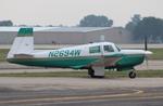 Aircraft N2694W, Mooney M20E, at KOSH, photo by MarkPasqualino