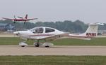 Aircraft N243DS, Diamond DA 40, at KOSH, photo by MarkPasqualino