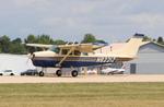 Aircraft N8221Z, Cessna 205, at KOSH, photo by MarkPasqualino
