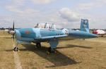 Aircraft N34MK, Beech T-34A, at KOSH, photo by MarkPasqualino