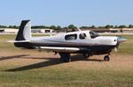 Aircraft N9113F, Mooney M20J, at KOSH, photo by MarkPasqualino