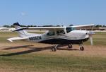 Aircraft N8052M, Cessna T210M, at KOSH, photo by MarkPasqualino