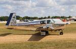 Aircraft N65GL, Mooney M20E, at KOSH, photo by MarkPasqualino