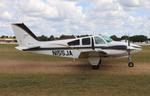 Aircraft N155JA, Beech B55, at KOSH, photo by MarkPasqualino